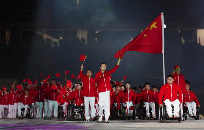 (261018) -- NAGOYA, Oct. 18, 2026 -- The delegation of China parades into the stadium during the opening ceremony of the Aichi-Nagoya Asian Para Games in Nagoya, Japan, Oct. 18, 2026. ) (SP)JAPAN-NAGOYA-ASIAN PARA GAMES-OPENING CEREMONY JiaxHaocheng 