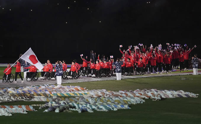 (261018) -- NAGOYA, Oct. 18, 2026 -- The delegation of Japan parades into the stadium during the opening ceremony of the Aichi-Nagoya Asian Para Games in Nagoya, Japan, Oct. 18, 2026. ) (SP)JAPAN-NAGOYA-ASIAN PARA GAMES-OPENING CEREMONY CaixYang 