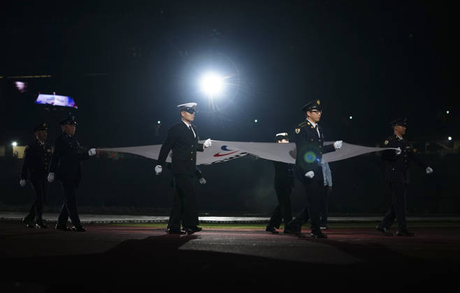 (261018) -- NAGOYA, Oct. 18, 2026 -- The flag of the Asian Paralympic Committee is carried during the opening ceremony of the Aichi-Nagoya Asian Para Games in Nagoya, Japan, Oct. 18, 2026. ) (SP)JAPAN-NAGOYA-ASIAN PARA GAMES-OPENING CEREMONY JiaxHaocheng 