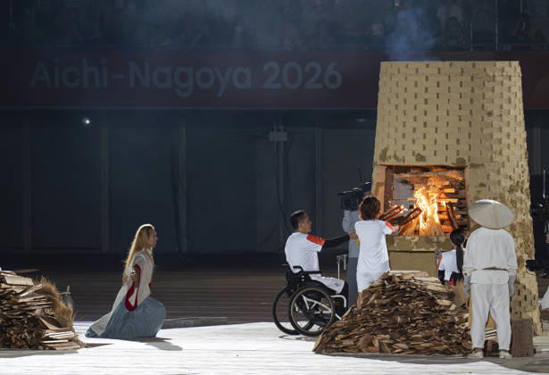 (261018) -- NAGOYA, Oct. 18, 2026 -- Torch bearers light the cauldron during the opening ceremony of the Aichi-Nagoya Asian Para Games in Nagoya, Japan, Oct. 18, 2026. ) (SP)JAPAN-NAGOYA-ASIAN PARA GAMES-OPENING CEREMONY CaixYang 