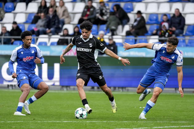 v li Natnael Abraha TSG II, 2, Andre Leipold Verl, 20, Sean Dulic TSG II, 3, tackle, game scene, duel, tackle, tackling, dynamics, action, 18 10 2026, Sinsheim, Germany, soccer, 3rd Division, TSG 1899 Hoffenheim II vs. SC Verl, DFB and DFL regulations prohibit any use of photographs as image sequences and or quasi-video xozx