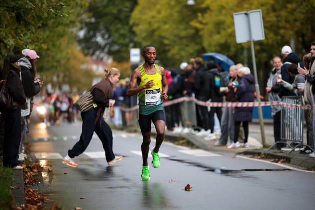 RECORD DATE NOT STATED 18th October 2026; Amsterdam, Netherlands; TCS Amsterdam Marathon; A runner from South Africa runs along Beethovenstraat AnthonyxBenoit