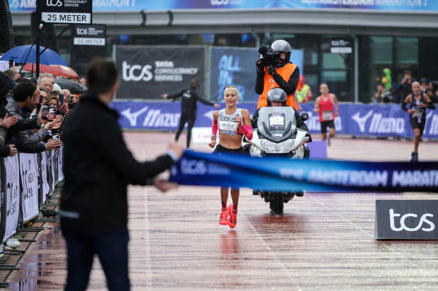 RECORD DATE NOT STATED 18th October 2026; Amsterdam, Netherlands; TCS Amsterdam Marathon; Mikky Keetels of the Netherlands crosses the finish line as the fastest Dutch woman, 14th, in a personal best time of 2:30:36 AnthonyxBenoit