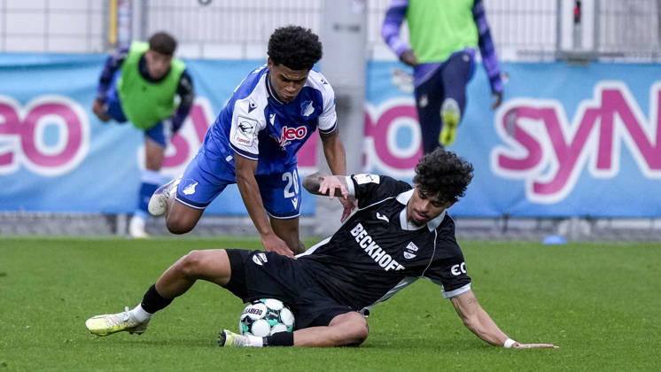 from left: Andre Leipold (Verl), 20, Tiago Poller (TSG II), 20, tackle, game scene, duel, tackle, tackling, dynamic, action, 18 10 2026, Sinsheim, Germany, soccer, 3rd Division, TSG 1899 Hoffenheim II vs. SC Verl, DFB and DFL regulations prohibit any use of photographs as image sequences and or quasi-video xozx