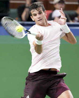 (261018) -- SHANGHAI, Oct. 18, 2026 -- Rafael Jodar of Spain hits a return during the men s singles final match against Alejandro Davidovich Fokina of Spain at the 2026 ATP, Tennis Herren tour Shanghai Masters tennis tournament in Shanghai, China, Oct. 18, 2026. ) (SP)CHINA-SHANGHAI-TENNIS-SHANGHAI MASTERS-MEN S SINGLES (CN) WangxXiang 