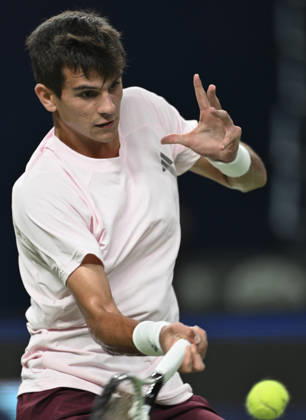 (261018) -- SHANGHAI, Oct. 18, 2026 -- Rafael Jodar of Spain hits a return during the men s singles final match against Alejandro Davidovich Fokina of Spain at the 2026 ATP, Tennis Herren tour Shanghai Masters tennis tournament in Shanghai, China, Oct. 18, 2026. ) (SP)CHINA-SHANGHAI-TENNIS-SHANGHAI MASTERS-MEN S SINGLES (CN) ChenxHaoming 