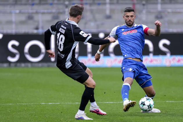 Fabian Wessig (Verl), 18, Diren Dagdeviren (TSG II), 8, tackle, game scene, duel, tackle, tackling, dynamic, action, 10 18 2026, Sinsheim, Germany, soccer, 3rd League, TSG 1899 Hoffenheim II vs. SC Verl, DFB and DFL regulations prohibit any use of photographs as image sequences and or quasi-video xozx
