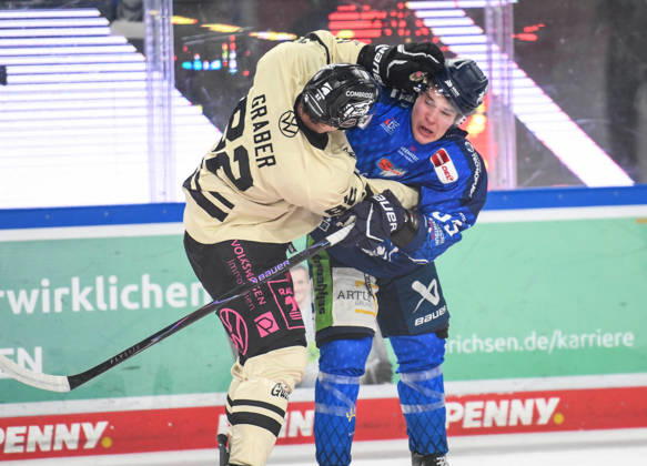 Straubing Tigers vs. Grizzlys Wolfsburg, Ice Hockey, German Ice Hockey League, Penny DEL, Matchday 10, 2026–2027 Season, October 18, 2026: Simon Seidl of the Straubing Tigers in a scuffle with William Graber of the Grizzlys Wolfsburg, Men’s Ice Hockey, German Ice Hockey League, Penny DEL, Matchday 10, 2026–2027 Season on October 18, 2026, at the Eisstadion am Pulverturm, Straubing Tigers (blue) vs. Grizzlys Wolfsburg (beige)