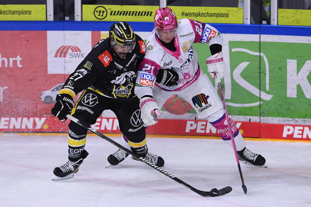 Ice Hockey Penny DEL Matchday 10: Krefeld Pinguine vs. Eisbären Berlin on October 18, 2026, at the Yayla Arena in Krefeld; Clinston Joseph Robert C. J. Suess (Krefeld), on the left, Manuel Wiederer (Berlin); on the right, In accordance with the guidelines of the DEL (German Ice Hockey League), the publication and further use of the footage in electronic media and on devices of any kind during the game is not permitted. xRx