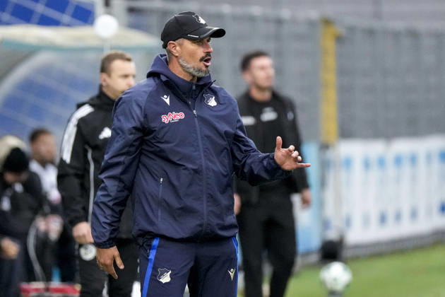 Stefan Kleineheismann, coach and head coach of TSG II, gives instructions, gesturing with his arms; single frame, single photo, action, October 18, 2026, Sinsheim, Germany, soccer, 3rd Division, TSG 1899 Hoffenheim II vs. SC Verl; DFB and DFL regulations prohibit any use of photographs as image sequences and or quasi-video xozx