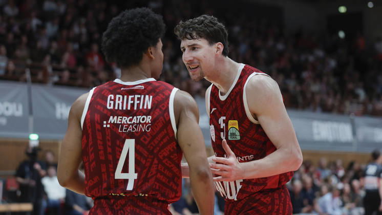 Pictured from left: Sam Griffin (Wuerzburg Baskets, 4) and Alen Pjanic (Wuerzburg Baskets, 35) are talking on October 18, 2026, Fitness First Würzburg Baskets vs. SYNTAINICS MBC, Netto BBL Cup, Round of 16, Germany, 97072, tectake Arena Würzburg, Copyright: HMBxMedia xJulienxBecker