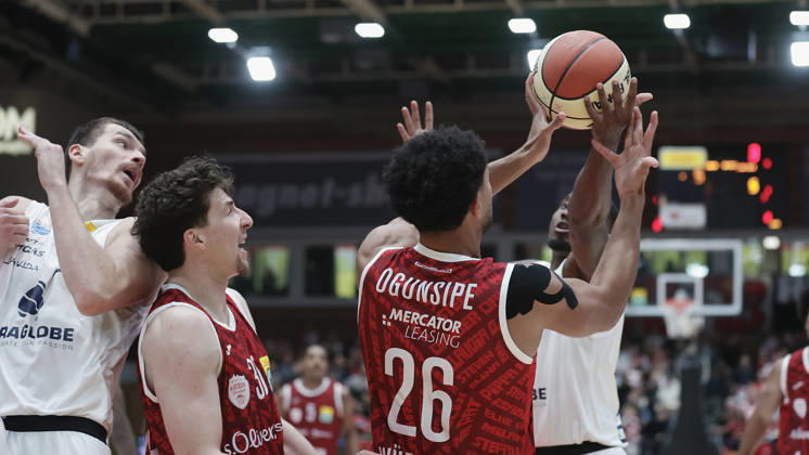 Pictured, from left: Borisa Simanic of Syntainics MBC, 22, Alen Pjanic of Würzburg Baskets, 35, and the battle for rebounds between Marvin Ogunsipe of Würzburg Baskets, 26, and Kris Clyburn of Syntainics MBC, 21 18 10 2026, Fitness First Würzburg Baskets vs. SYNTAINICS MBC, Netto BBL Cup, Round of 16, Germany, 97072, tectake Arena Würzburg, Copyright: HMBxMedia xJulienxBecker