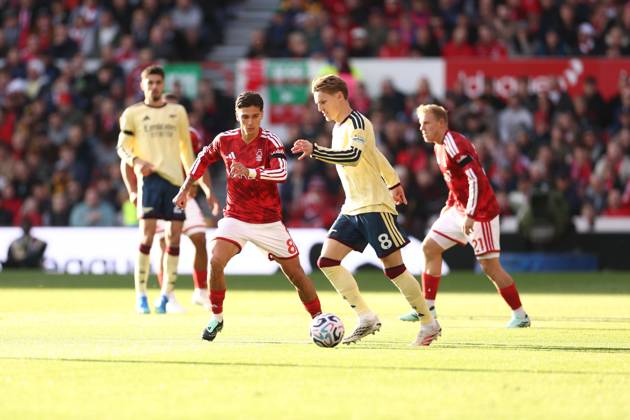 Nicolas Dominguez of Nottingham Forest and Martin Odegaard of Arsenal Nottingham Forest v Arsenal, Premier League, Football, City Ground, Nottingham, UK - 18 Oct 2026Nottingham City Ground United Kingdom EDITORIAL USE ONLY No use with unauthorised audio, video, data, fixture lists, club league logos or live services. Online in-match use limited to 120 images, no video emulation. No use in betting, games or single club league player publications. Copyright: xRYANxBROWNE Shutterstockx 17222656al