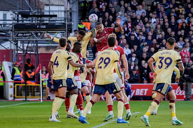 Premier League: Nottingham Forest v Arsenal Murillo of Nottingham Forest leaps to head the ball challenged by Ezri Konsa of Arsenal during the Premier League match Nottingham Forest vs Arsenal at City Ground, Nottingham, United Kingdom on 18 October 2026 (Photo by Maynard Manyowa News Images) Nottingham City Ground Nottinghamshire United Kingdom Copyright: xMaynardxManyowa NewsxImagesx
