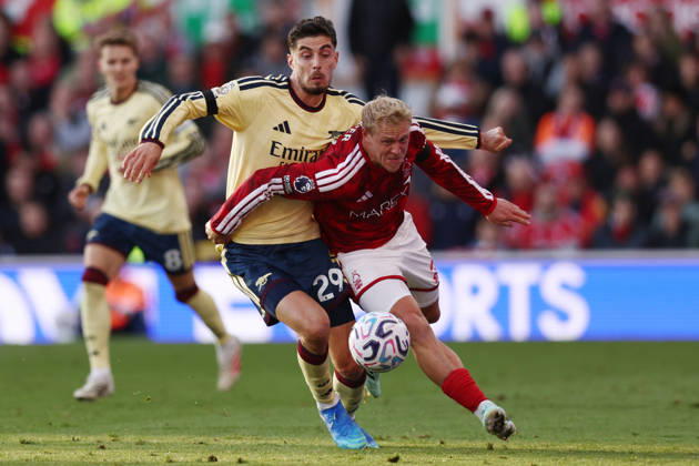 Nottingham, England, 18th October 2026. Kai Havertz of Arsenal and Xaver Schlager of Nottingham Forest challenge for the ball during the Nottingham Forest vs Arsenal Premier League match at the City Ground, Nottingham. Picture credit should read: Jake Youle Sportimage EDITORIAL USE ONLY. No use with unauthorised audio, video, data, fixture lists, club league logos or live services. Online in-match use limited to 120 images, no video emulation. No use in betting, games or single club league player publications. SPI_026_JY_Forest_Arsenal SPI-5083-0026