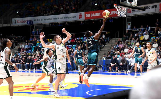 October 18, 2026, xokbx, BBL Basketball Cup, Frankfurt Skyliners vs. VET Concept Gladiators Trier, featuring Isaiah Swope of the Fraport Skyliners Frankfurt and Marten Linssen of the Gladiators Trier, head-to-head matchup, duel, shot, Frankfurt am Main