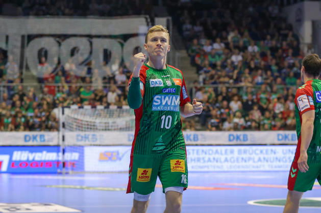 October 18, 2026, xgox, Handball, Opel HBL, SC Magdeburg vs. TVB Stuttgart, emspor, from left: Gisli, Thorgeir, Kristjansson, Magdeburg, 10, cheering, goal celebration, celebrating the goal, Magdeburg