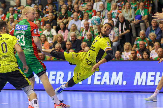 October 18, 2026, xgox, Handball Opel HBL SC Magdeburg vs. TVB Stuttgart emspor, from left: Philipp Ahouansou (Stuttgart), 5 goals, goal scorer, scores a goal, goal, scores the goal (Magdeburg)