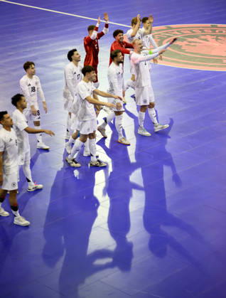 Team Germany celebrates the final goal; the Mexican wave; from left to right: Christopher Wittig (GER), goalkeeper Pavlos Wiegels (GER), Maximilian Grünberg GER, Kim Herterich GER, Theodoros Xydias GER—Futsal World Cup Qualifier: Germany vs. Lithuania, 4–2, on October 18, 2026, in Mülheim an der Ruhr, Germany, at the Westenergie Sporthalle