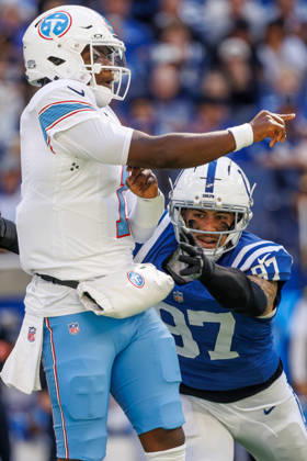 October 18, 2026, Indianapolis, Indiana, U.S: Tennessee Titans quarterback Cam Ward (1) is hit by Indianapolis Colts defensive lineman Laiatu Latu (97) as he gets rid of the ball during the game between the Tennessee Titans and the Indianapolis Colts at Lucas Oil Stadium, Indianapolis, Indiana. NFL, American Football Herren, USA 2026 Titans 26-20 Colts  - ZUMAs304 20261018_zaf_s304_035 Copyright: xScottxStuartx