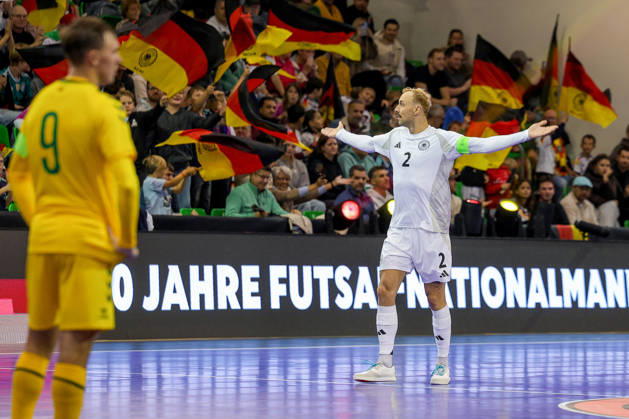 October 18, 2026, xsefx, Futsal, World Cup Qualifier, Germany vs. Lithuania, Westenergie Sports Hall, Mülheim an der Ruhr, 2026–2027 season: Goal celebration with arms outstretched after the 2–2 goal by scorer Christopher Wittig (Germany 02), together with the fans in the arena. DFB regulations prohibit any use of photographs as image sequences and or quasi-video. North Rhine-Westphalia, Germany