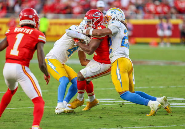 Oct 18, 2026: Kansas City Chiefs running back Kenneth Walker (9) gets tackled by Los Angeles Chargers safety Genesis Smith (22) in Kansas City, MO, USA; at Arrowhead Stadium. Mandatory Credit: -Cal Media Kansas City USA - ZUMAc04_ 20261018_zma_c04_219 Copyright: xRomanxPunox