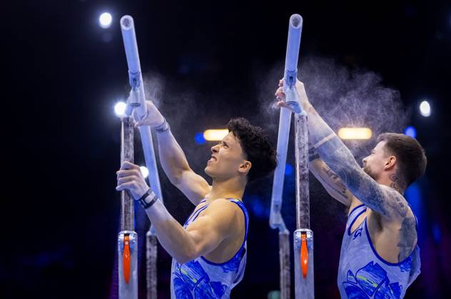 ROTTERDAM - Casimir Schmidt and Jermain Gruenberg in action during the men s team final at the World Gymnastics Championships in Rotterdam Ahoy. IRIS VAN DEN BROEK ANP xVIxANPxSportx xxANPxIVx 573087139 originalFilename: 573087139.jpg