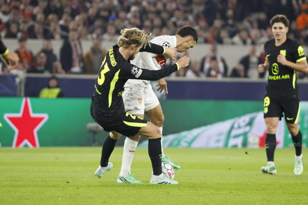 Morten Hjulmand of Atlético Madrid, No. 23, and Bilal El Khannouss of VfB Stuttgart, No. 11, in a tackle, Germany, soccer, UEFA Champions League, Matchday 3, 2026–2027, VfB Stuttgart vs. Atlético Madrid, October 20, 2026, Stuttgart Arena, Stuttgart, Germany Copyright: xGrantxHubbsx