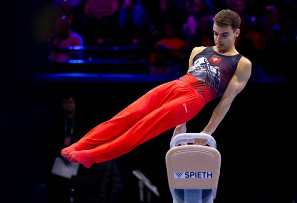 ROTTERDAM - Dominic Tamsell (SUI) in action during the men s team final at the World Gymnastics Championships in Rotterdam Ahoy. IRIS VAN DEN BROEK ANP xVIxANPxSportx xxANPxIVx 573106300 originalFilename: 573106300