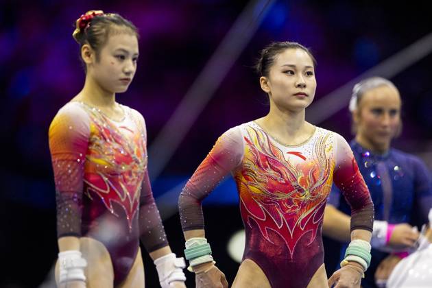 ROTTERDAM - Chinese gymnasts during the team final at the World Gymnastics Championships in Rotterdam Ahoy. IRIS VAN DEN BROEK ANP xVIxANPxSportx xxANPxIVx 573182546 originalFilename: 573182546.jpg