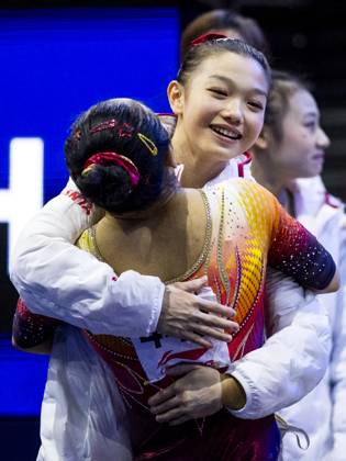 ROTTERDAM - Chinese gymnasts during the team final at the World Gymnastics Championships in Rotterdam Ahoy. IRIS VAN DEN BROEK ANP xVIxANPxSportx xxANPxIVx 573186505 originalFilename: 573186505.jpg