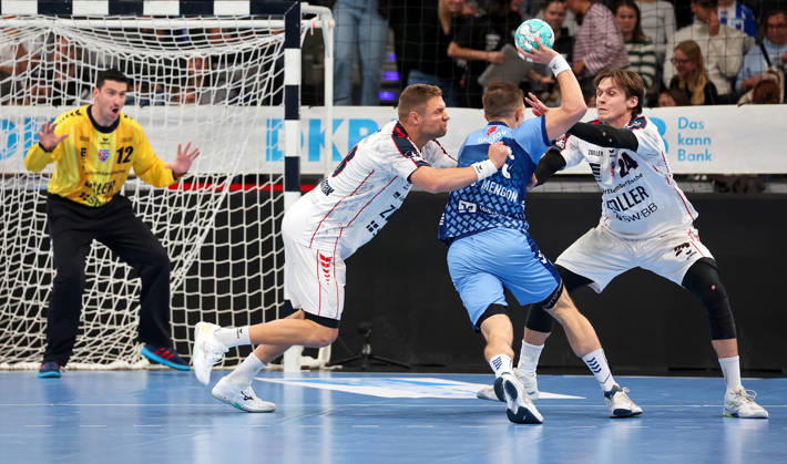 October 22, 2026, Germany, Stuttgart, Opel HBL, 2026–2027 Bundesliga, TVB Stuttgart vs. SG BBM Bietigheim, from left: Fabian Wiederstein (BBM), Simone Mengon (TVB), Maxim Orlov (BBM)