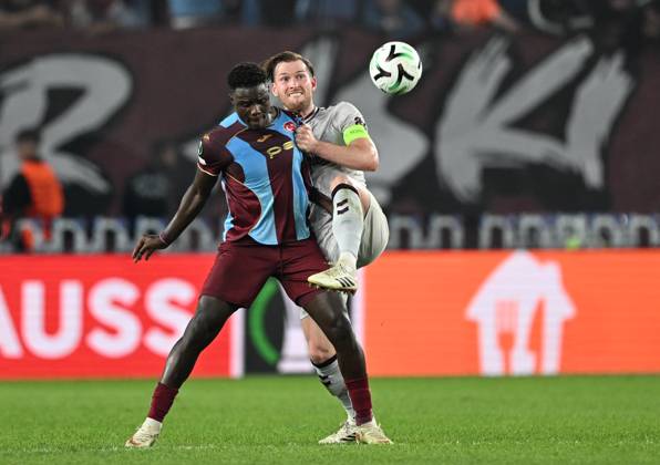 Trabzonspor v Hearts - UEFA Conference League TRABZON, TURKIYE - OCTOBER 22: Franculino (L) of Trabzonspor in action against Jamie McCart of Hearts during UEFA Conference League week 2 football match between Trabzonspor and Hearts at Papara Park in Trabzon, Turkiye on October 22, 2026. Hakan Burak Altunoz Anadolu Trabzon Turkey. Editorial use only. Please get in touch for any other usage.  Copyright: x2026xAnadoluxHakanxBurakxAltunozx
