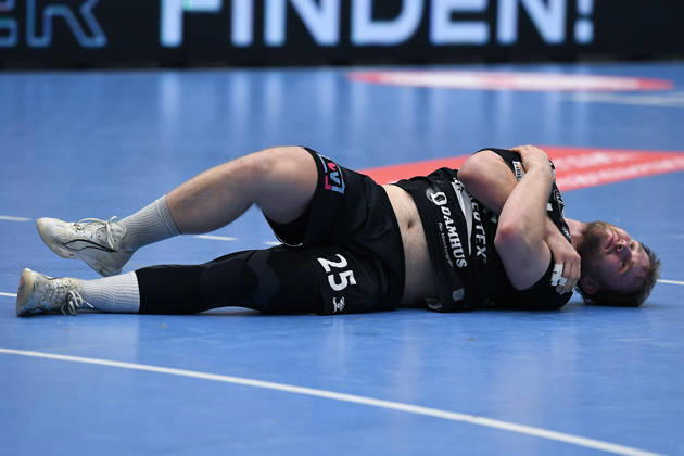 Handball Bundesliga, Matchday 8: TuSEM Essen vs. TV Emsdetten on October 19, 2026, at Sportpark Am Hallo in Essen. Jaris Tobeler of Emsdetten lies injured on the floor. xRx