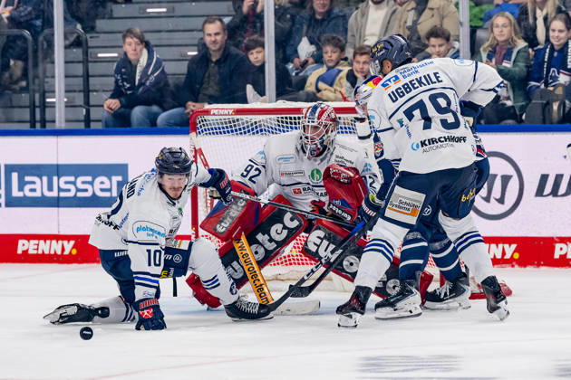 Tobias Rieder, EHC Red Bull Munich, No. 08, misses a shot against Tyler Boland, Iserlohn Roosters, No. 10; Andreas Jenike, goaltender, Iserlohn Roosters, No. 92; and Colin Ugbekile, Iserlohn Roosters, No. 79 (GER), EHC Red Bull Munich vs. Iserlohn Roosters, DEL, 2026–2027 season, Matchday 11, October 23, 2026. Photo: HMB Media, Franz Feiner Copyright: HMBxMedia FranzxFeiner