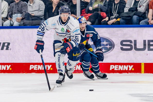 Robin Norell, Iserlohn Roosters, 56, pursued by Lucas Thaler, EHC Red Bull Munich, 48, GER; EHC Red Bull Munich vs. Iserlohn Roosters, DEL, 2026–2027 season, Matchday 11, October 23, 2026 Photo: HMB Media, Franz Feiner Copyright: HMBxMedia FranzxFeiner