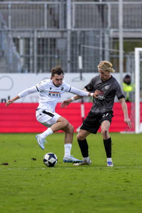 From left: Florian Engelhardt (SVS), 12, Vico Meien (Aalen), 27, tackle, game scene, duel, tackle, tackling, dynamic, action, 10 24 2026, Sandhausen, Germany, soccer, Regionalliga Southwest, SV Sandhausen vs. VfR Aalen xozx