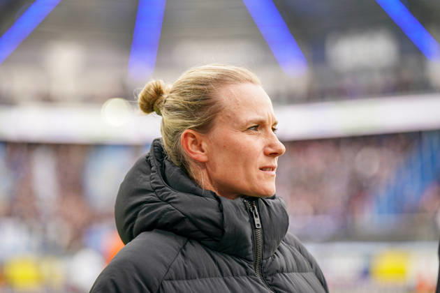 Germany Soccer Bundesliga 2026–2027, Matchday 7: SC Paderborn vs. Hamburger SV at Home Deluxe Arena in Paderborn. Kathleen Krüger, sporting director of Hamburger SV (HSV), the first full-time female sporting director in Bundesliga history and former team manager of FC Bayern Munich. Portrait, close-up on the sidelines at Home Deluxe Arena in Paderborn, wearing a black winter jacket, smiling, looking to the side; soccer, Bundesliga, SC Paderborn 07, Hamburger SV, sports management, sports director, club leadership, female official, women in soccer, management, sports venue, facial expressions, emotion Copyright: xJOERANxSTEINSIEKx