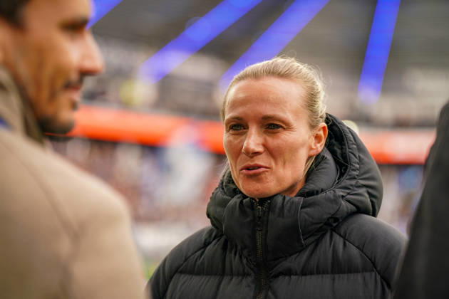 Germany Soccer Bundesliga 2026–2027, Matchday 7: SC Paderborn vs. Hamburger SV at Home Deluxe Arena in Paderborn. Kathleen Krüger, sporting director of Hamburger SV (HSV), the first full-time female sporting director in Bundesliga history and former team manager of FC Bayern Munich. Portrait, close-up on the sidelines at Home Deluxe Arena in Paderborn, wearing a black winter jacket, smiling, looking to the side; soccer, Bundesliga, SC Paderborn 07, Hamburger SV, sports management, sports director, club leadership, female official, women in soccer, management, sports venue, facial expressions, emotion Copyright: xJOERANxSTEINSIEKx