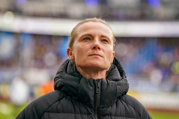 Germany Soccer Bundesliga 2026–2027, Matchday 7: SC Paderborn vs. Hamburger SV at Home Deluxe Arena in Paderborn. Kathleen Krüger, sporting director of Hamburger SV (HSV), the first full-time female sporting director in Bundesliga history and former team manager of FC Bayern Munich. Portrait, close-up on the sidelines at Home Deluxe Arena in Paderborn, wearing a black winter jacket, smiling, looking to the side; soccer, Bundesliga, SC Paderborn 07, Hamburger SV, sports management, sports director, club leadership, female official, women in soccer, management, sports venue, facial expressions, emotion Copyright: xJOERANxSTEINSIEKx
