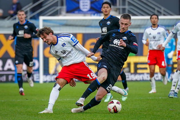 German Soccer Bundesliga 2026–2027, Matchday 7: SC Paderborn vs. Hamburger SV at Home Deluxe Arena, Paderborn. Tjark Scheller (Paderborn) and Otto Stange (Hamburger SV), No. 19, in a tackle. Copyright: xJOERANxSTEINSIEKx