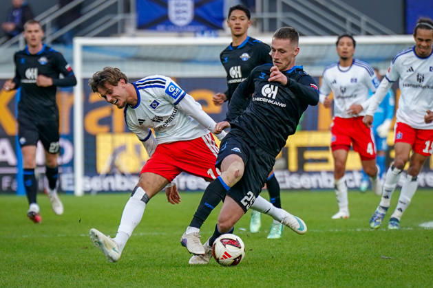 German Soccer Bundesliga 2026–2027, Matchday 7: SC Paderborn vs. Hamburger SV at Home Deluxe Arena, Paderborn. Tjark Scheller (Paderborn) and Otto Stange (Hamburger SV), No. 19, in a tackle. Copyright: xJOERANxSTEINSIEKx