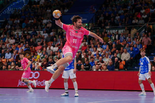 German Handball Bundesliga, Matchday 9: Dessau Roßlauer HV 06 vs. SC DHfK Leipzig; Lukas Binder of SC DHfK Leipzig, No. 11, taking a jump shot on October 24, 2026, at the Anhalt Arena, Dessau-Roßlau, Saxony-Anhalt; Dessau-Roßlau, Anhalt Arena, Saxony-Anhalt, Germany