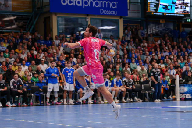 German Handball Bundesliga, Matchday 9: Dessau Roßlauer HV 06 vs. SC DHfK Leipzig; Lukas Binder of SC DHfK Leipzig, No. 11, taking a jump shot on October 24, 2026, at the Anhalt Arena, Dessau-Roßlau, Saxony-Anhalt; Dessau-Roßlau, Anhalt Arena, Saxony-Anhalt, Germany