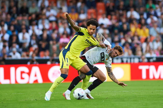 Pablo Maffeo of Valencia CF and Tajon Buchanan of Villarreal CF during the LaLiga EA Sports match between Valencia CF and Villarreal CF at Mestalla on October 24, 2026, in Valencia, Spain