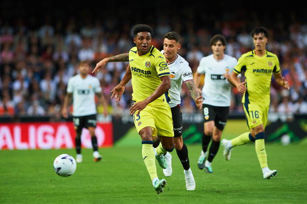Alex Freeman of Villarreal CF and Dani Raba of Valencia CF during the LaLiga EA Sports match between Valencia CF and Villarreal CF at Mestalla on October 24, 2026, in Valencia, Spain