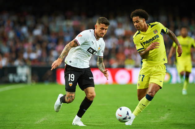 Dani Raba of Valencia CF and Tajon Buchanan of Villarreal CF during the LaLiga EA Sports match between Valencia CF and Villarreal CF at Mestalla on October 24, 2026, in Valencia, Spain