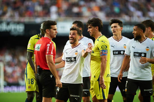 Jose Gaya of Valencia CF protests to the referee during the LaLiga EA Sports match between Valencia CF and Villarreal CF at Mestalla on October 24, 2026, in Valencia, Spain