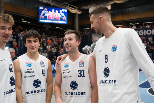 Mika Siegert (MBC), 42, Vuk Radojicic (MBC), 4, Spencer Reaves (MBC), 31, and Kresimir Nikic (MBC), 9, celebrate the 103–98 overtime home victory in the Syntainics MBC vs. Rostock Seawolves game, BBL, Men’s Basketball 1st Bundesliga, Matchday 6 of the 2026–27 season, October 24, 2026, Weißenfels Stadthalle, Saxony-Anhalt, Germany