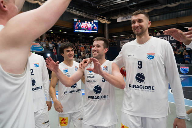 Vuk Radojicic (MBC), 4, Spencer Reaves (MBC), 31, and Kresimir Nikic (MBC), 9, celebrate the 103–98 overtime home victory in the Syntainics MBC vs. Rostock Seawolves game, BBL, Men’s Basketball 1st Bundesliga, Matchday 6 of the 2026–27 season, October 24, 2026, Weißenfels Stadthalle, Saxony-Anhalt, Germany